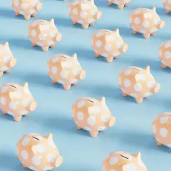 Rows of peach piggy banks with white polka dots on a light blue background. A fun visual for a 50/50 cash raffle.