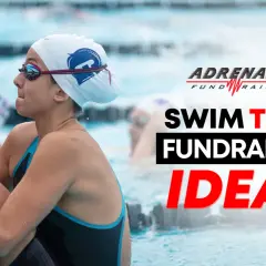 Young swimmers in a pool, ready for action. The image promotes swim team fundraising ideas.