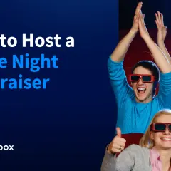 Excited people in 3D glasses cheer at a movie night fundraiser. Learn how to host your own!