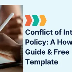 A hand signs a document on a tablet, illustrating conflict of interest policy examples.