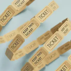 A chain of vintage tickets, each reading "TICKET" and "KEEP THIS TICKET," suggests a fun way to have a raffle without calling it a raffle.