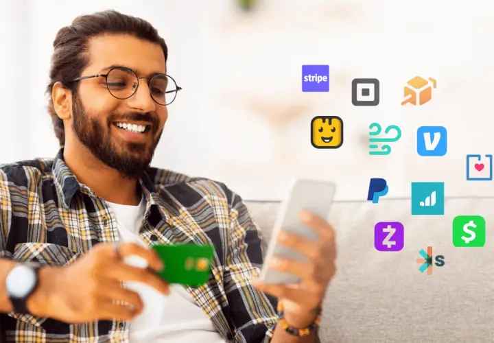 Smiling man with a credit card and phone surrounded by payment app icons, including Stripe, PayPal, and others, suggesting easy transactions and managing cheddar up fees.