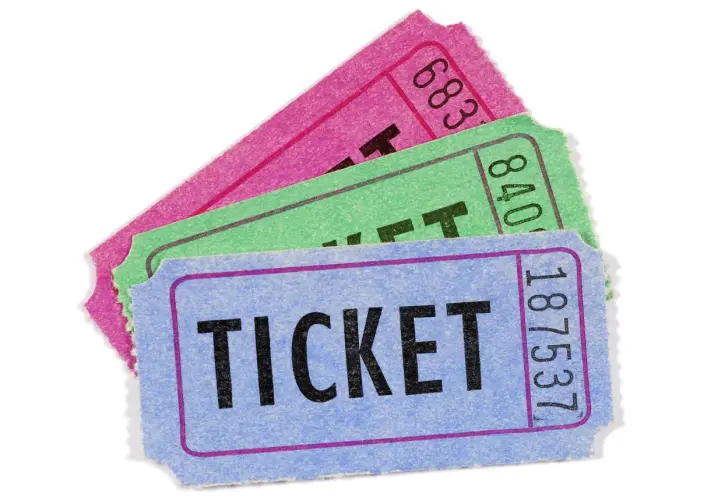 Three colorful raffle tickets, blue, green, and pink, are fanned out. Are raffles legal in California?