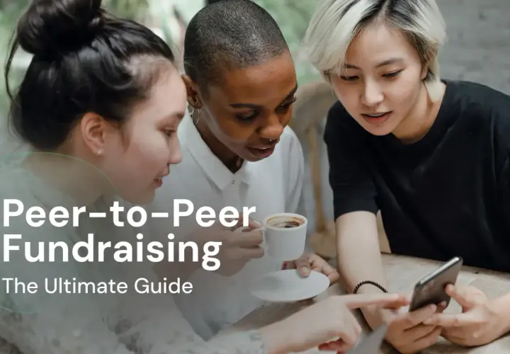 Three friends discuss peer-to-peer fundraising over coffee, looking at a smartphone.