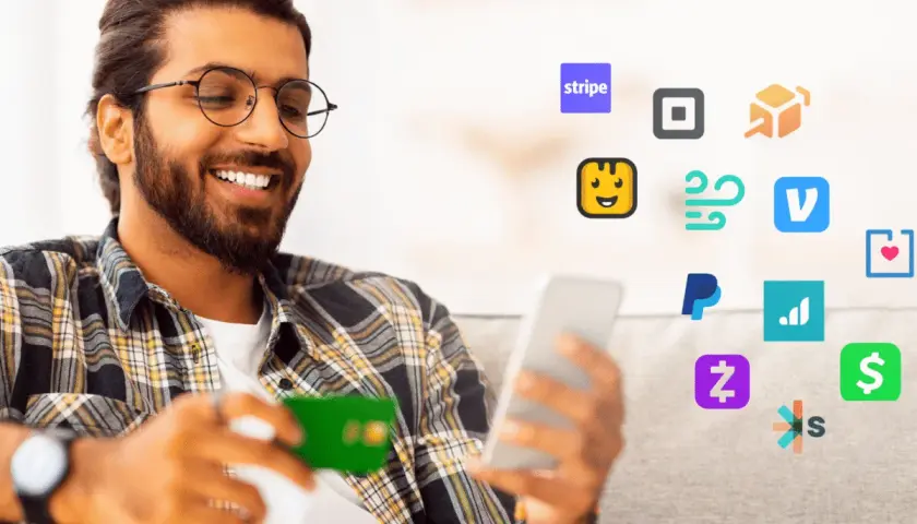 Smiling man with a credit card and phone surrounded by payment app icons, including Stripe, PayPal, and others, suggesting easy transactions and managing cheddar up fees.