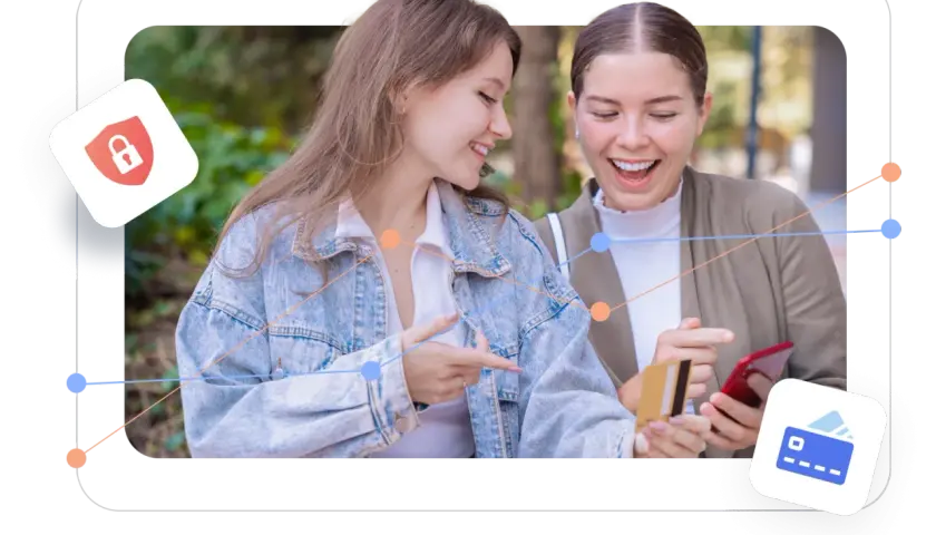 Two women excitedly look at a phone and credit card, suggesting easy transactions on giving day platforms.