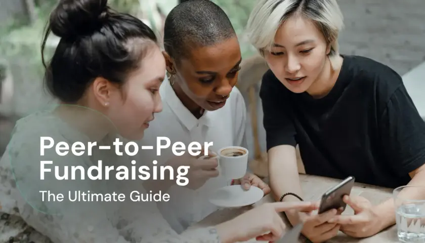 Three friends discuss peer-to-peer fundraising over coffee, looking at a smartphone.