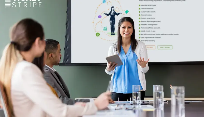 A presenter explains nonprofit event management tools, highlighting features for free event tickets for nonprofit organizations.