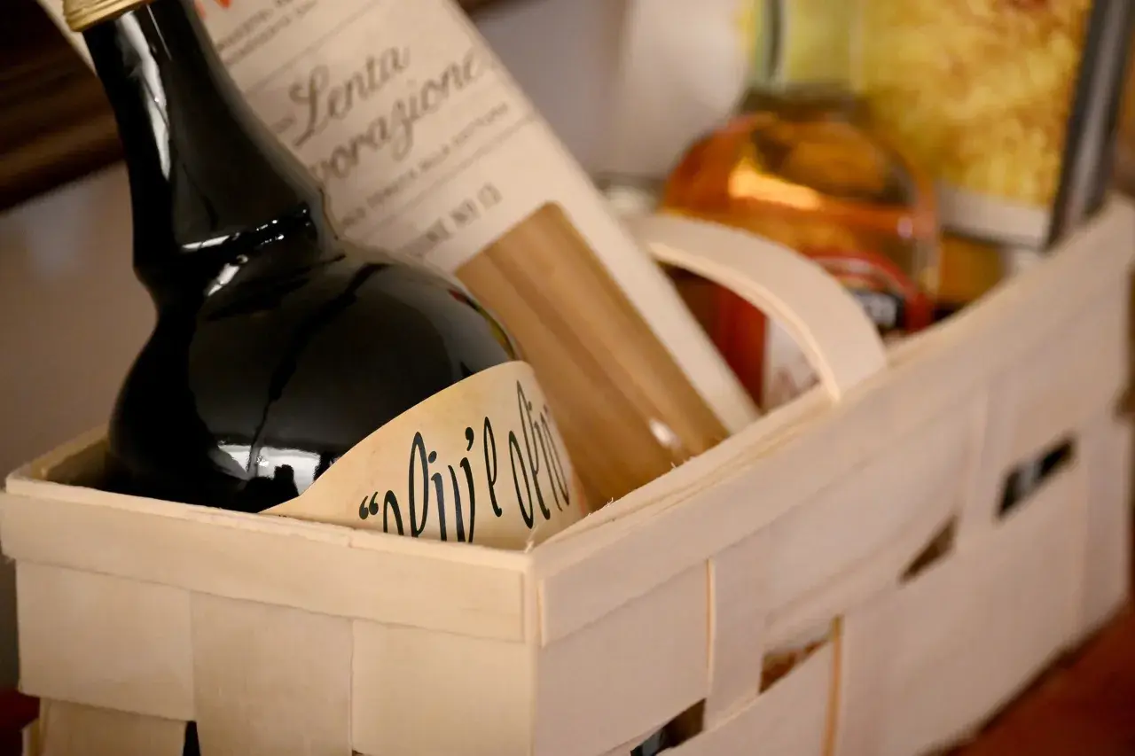 A gift basket with olive oil and pasta, perfect for a Chinese auction prize.
