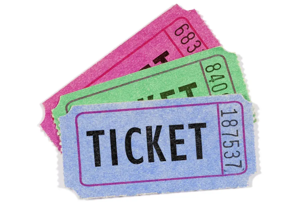 Three colorful raffle tickets, blue, green, and pink, are fanned out. Are raffles legal in California?