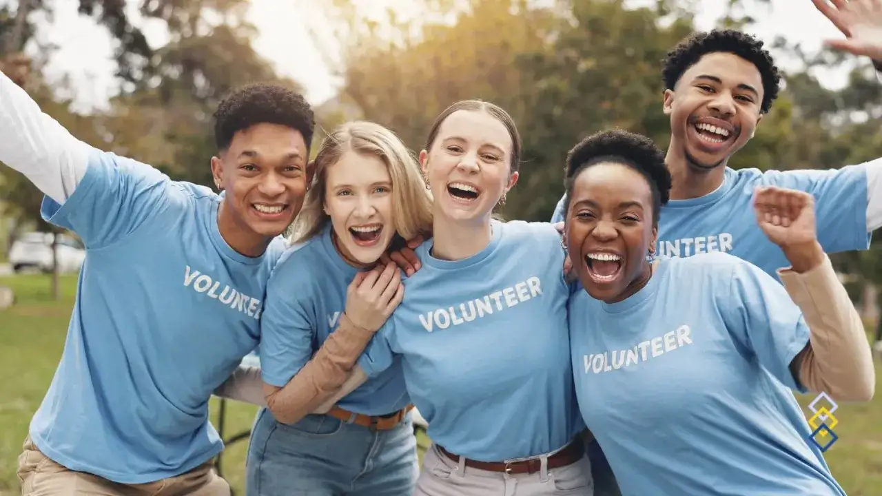 A diverse group of young people in blue